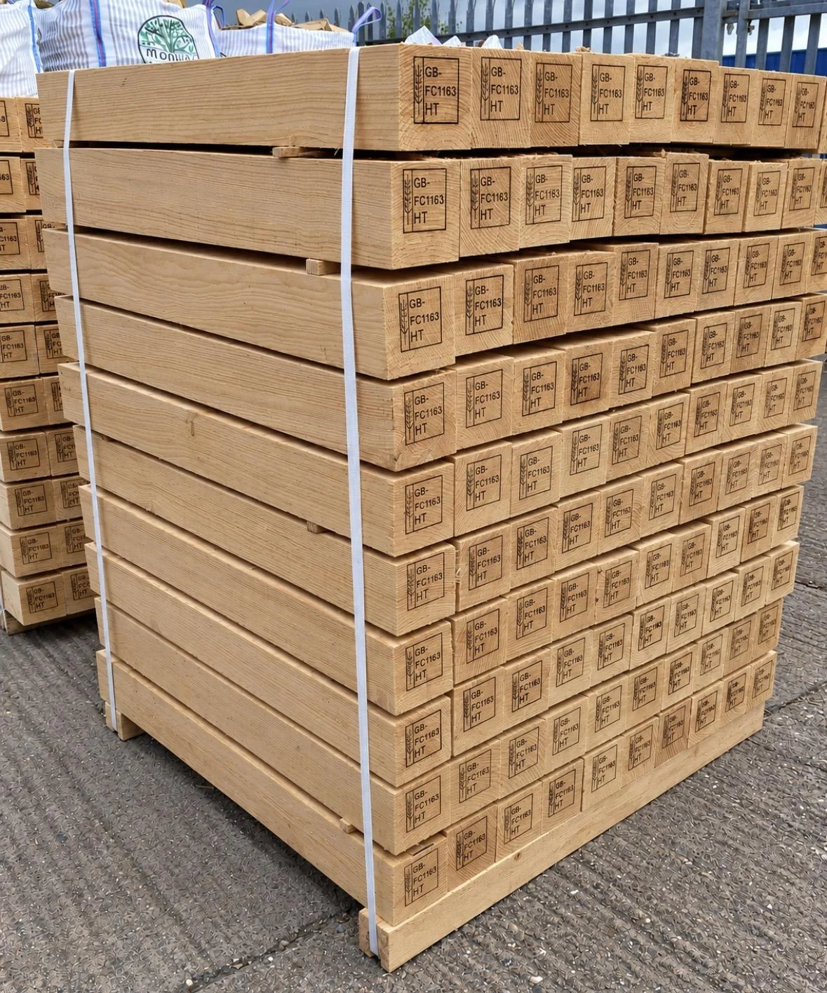 Stacks of heat-treated timber bearing ISPM15 stamps